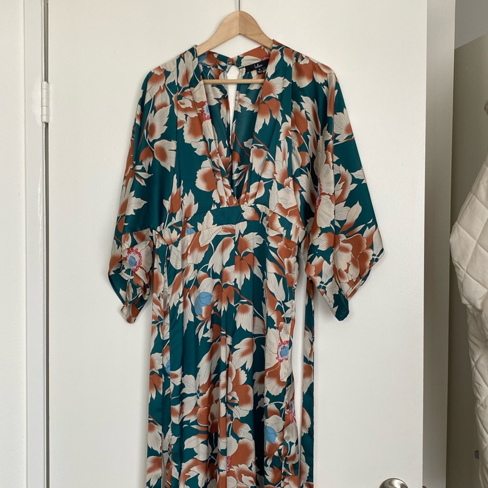 Lulu’s floral print silky jumpsuit, worn only once and dry cleaned after